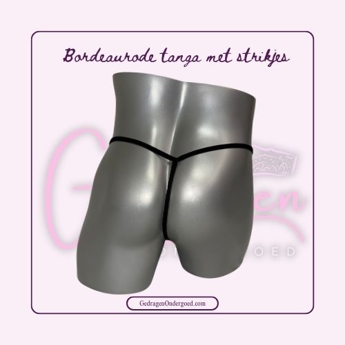 Achterkant Mooie zwarte tanga  gepresenteerd op een paspop