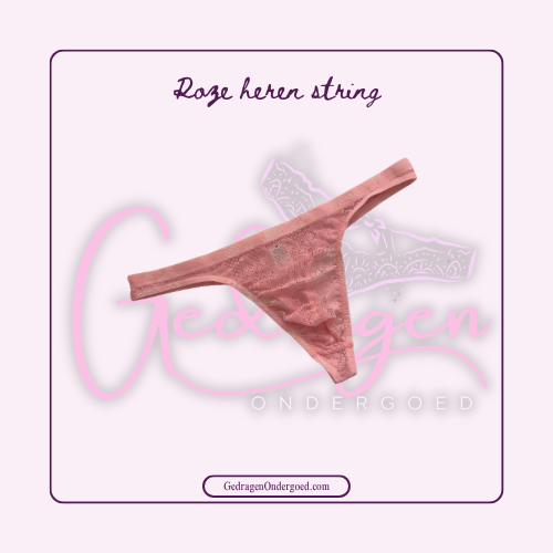 Roze heren string op de grond gepresenteerd