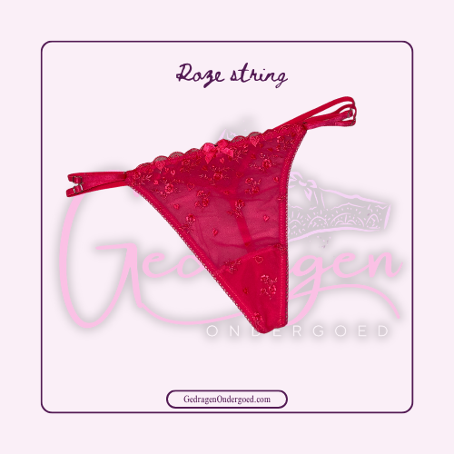 Voorkant neon roze string met kant liggend gepresenteerd
