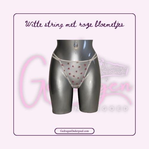 Witte Doorschijnende String met gestikte Bloemetjes gedragen door gedragen ondergoed gepresenteerd op een paspop