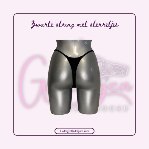 Achterkant Stoffen Zwarte String gedragen door gedragen ondergoed gepresenteerd op een paspop 