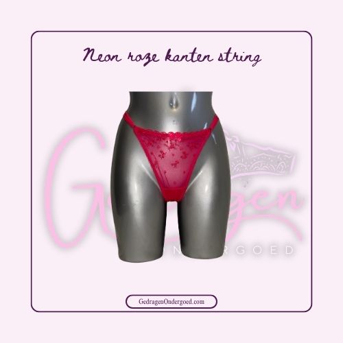 Neon roze kanten dames string van gedragen ondergoed gepresenteerd op een paspop