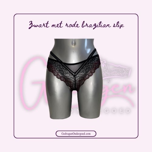 Zwarte kanten brazilian slip met rood er door heen gepresenteerd op een paspop